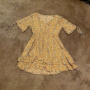 small yellow short sleeve dress with white mini flowers
